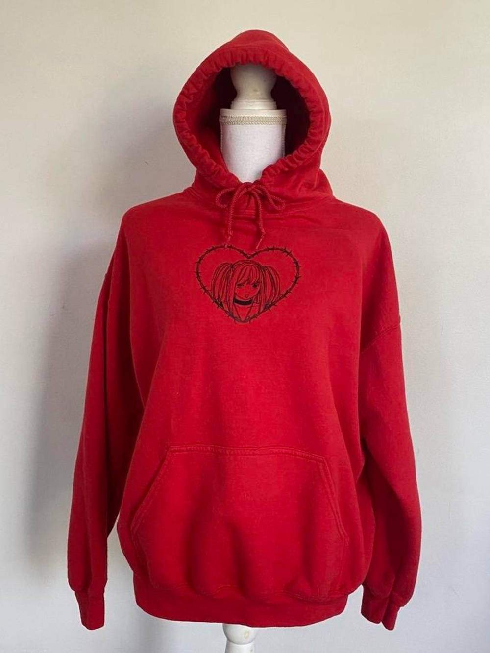 Red misa barbed wire heart sweatshirt.